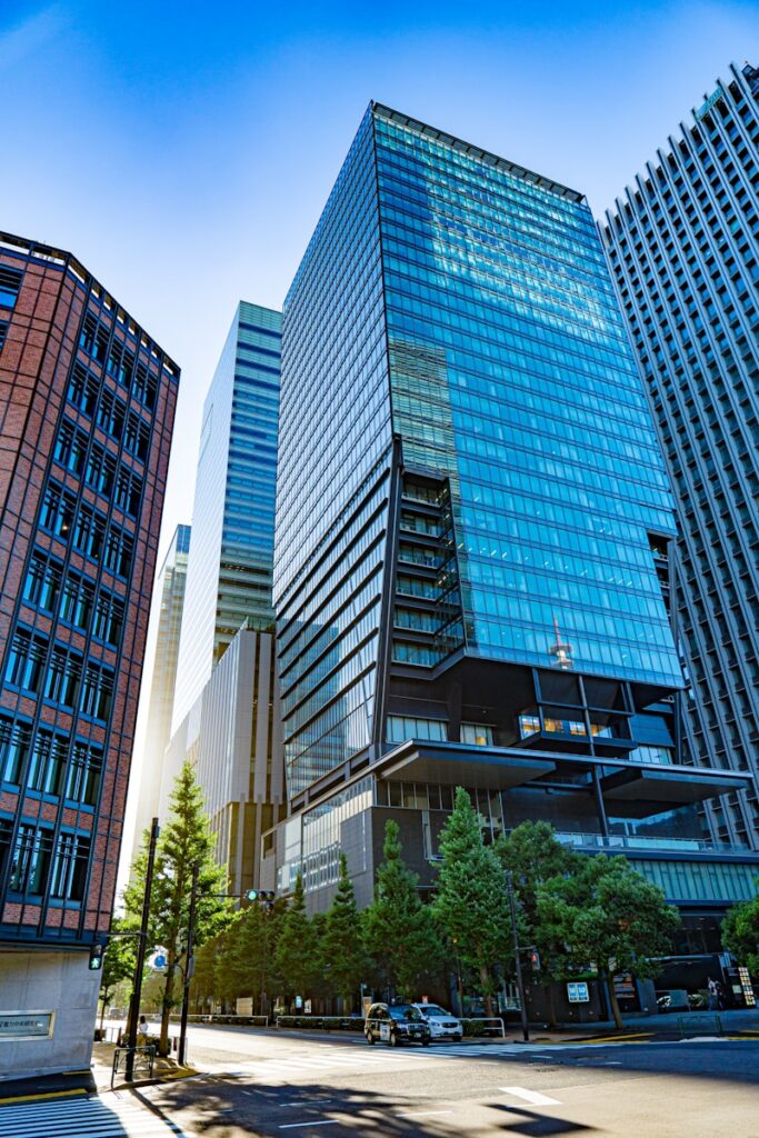 a group of tall buildings sitting next to each other